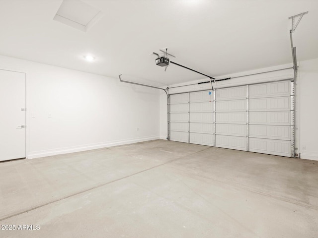 17703 W Southgate Ave, Goodyear, AZ 85338 - garage featuring baseboards and a garage door opener