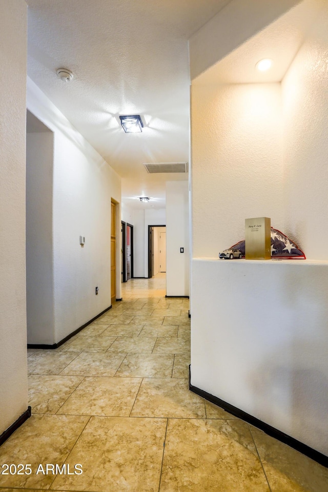 hallway with baseboards