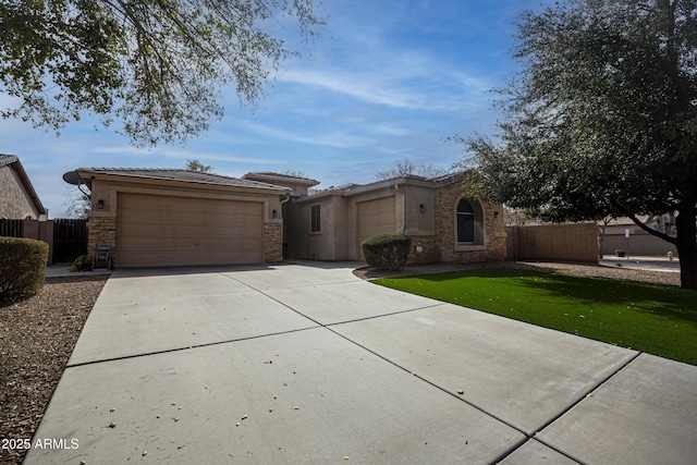 single story home with stucco siding, fence, a garage, driveway, and a tiled roof