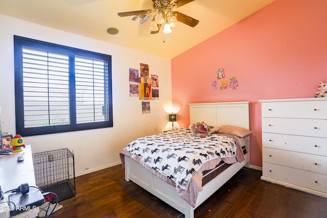 bedroom featuring lofted ceiling, a ceiling fan, visible vents, baseboards, and wood-type flooring