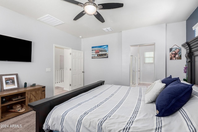 bedroom with ceiling fan and carpet