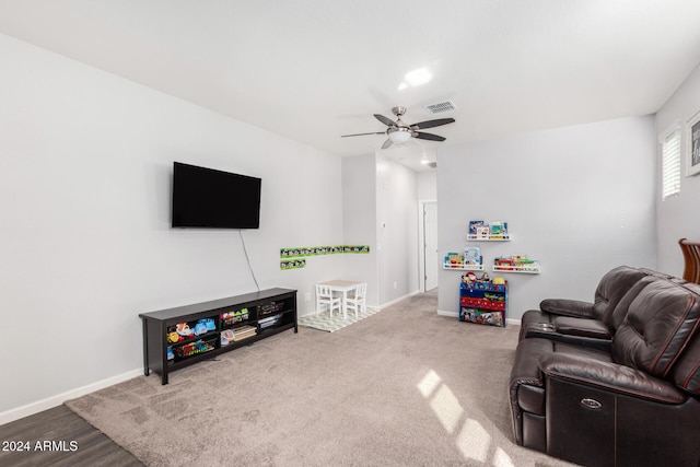 living room with ceiling fan