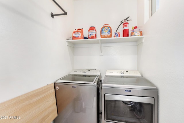 washroom with separate washer and dryer