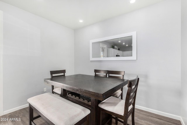 dining room featuring dark wood-type flooring