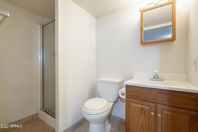 bathroom with walk in shower, tile patterned floors, vanity, and toilet