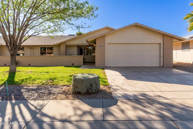 single story home with a front yard and a garage