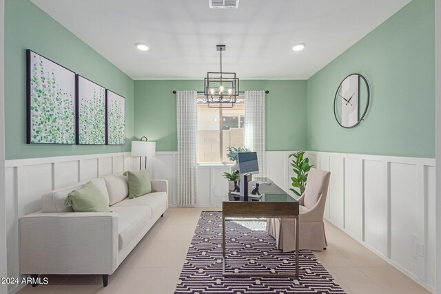 office area with a wainscoted wall, light tile patterned floors, recessed lighting, visible vents, and an inviting chandelier