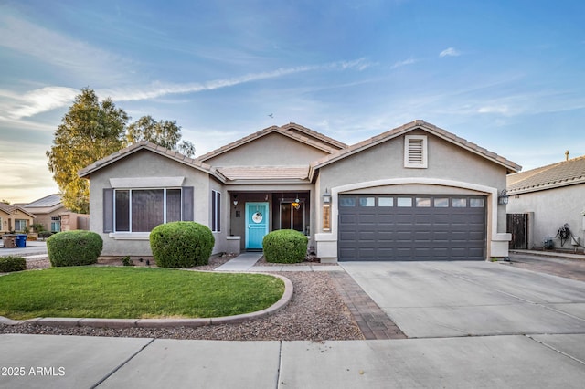 21604 E Calle De Flores, Queen Creek, AZ 85142 - ranch-style home featuring a tiled roof, a garage, concrete driveway, a front lawn, and stucco siding