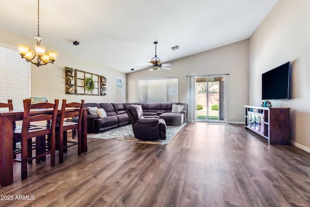 21604 E Calle De Flores, Queen Creek, AZ 85142 - living area with high vaulted ceiling, dark wood-style floors, baseboards, ceiling fan with notable chandelier, and visible vents