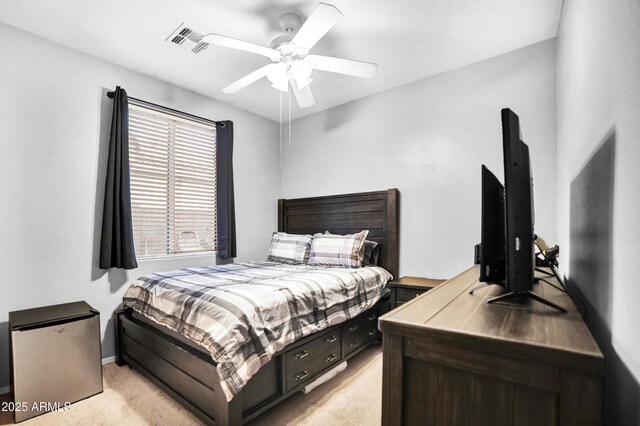 21604 E Calle De Flores, Queen Creek, AZ 85142 - bedroom with visible vents, a ceiling fan, and light carpet