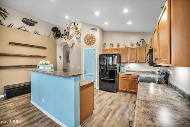 21604 E Calle De Flores, Queen Creek, AZ 85142 - kitchen with recessed lighting, a center island, visible vents, light wood-style flooring, and black appliances