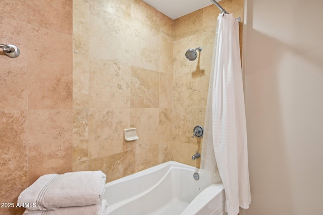 bathroom with shower / bath combo