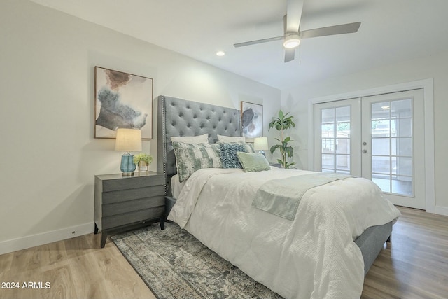 bedroom with access to outside, ceiling fan, french doors, and light hardwood / wood-style floors