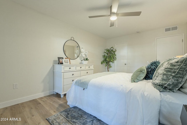 bedroom featuring ceiling fan and light wood-type flooring