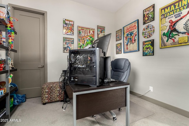carpeted home office with baseboards