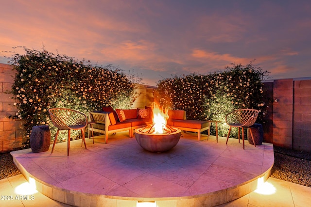 view of patio / terrace with an outdoor fire pit