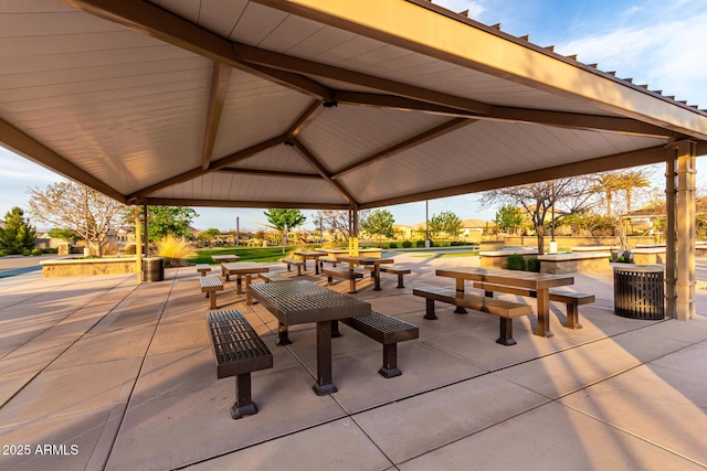 view of patio featuring central AC and a gazebo