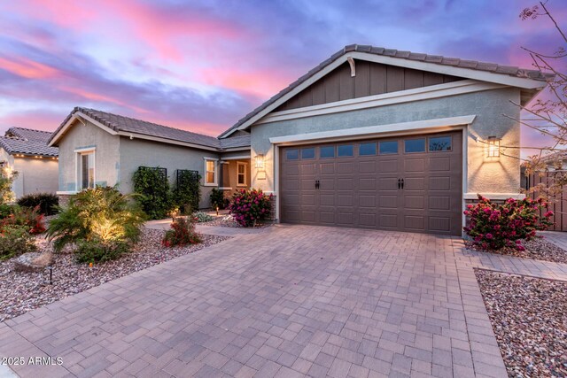 35112 N Jacobs Rd, San Tan Valley, AZ 85144 - single story home featuring stucco siding, an attached garage, a tiled roof, and decorative driveway