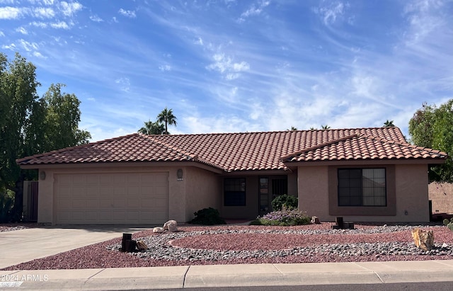 view of front of home with a garage