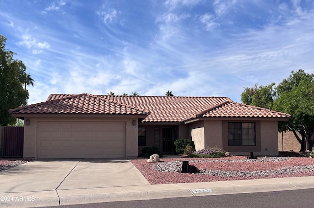 view of front of property featuring a garage