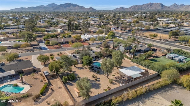 birds eye view of property featuring a mountain view