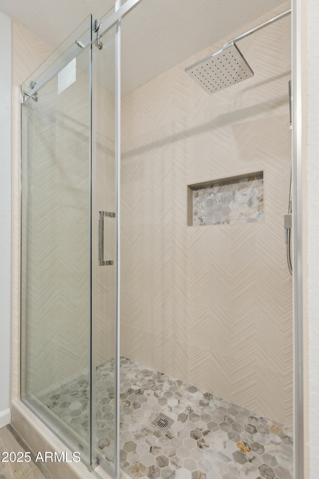 bathroom featuring walk in shower