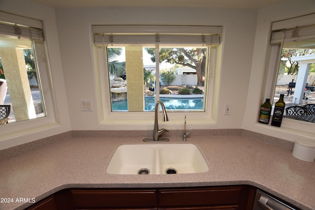 kitchen with sink and a wealth of natural light