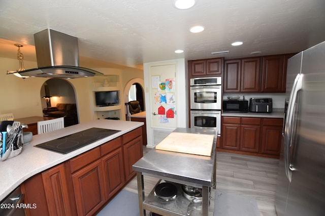 kitchen with light tile floors, black appliances, and island exhaust hood