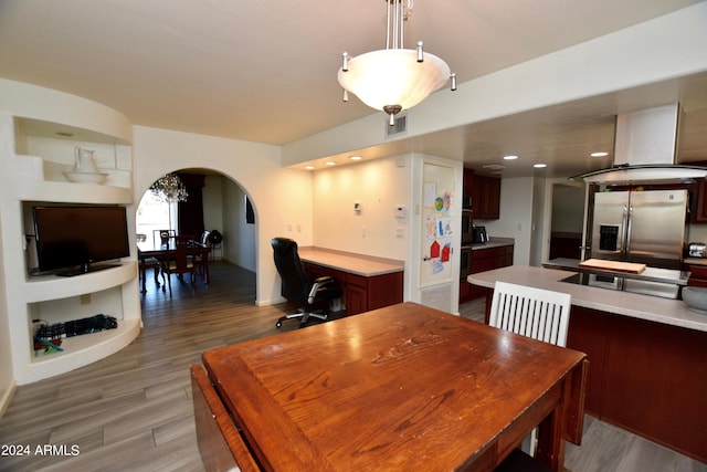 dining area featuring hardwood / wood-style floors