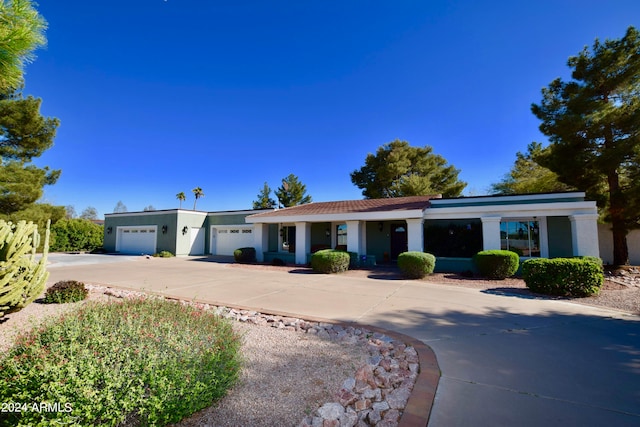 single story home with a garage