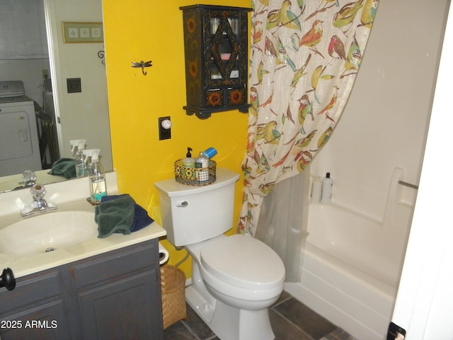 full bathroom featuring toilet, vanity, washer / clothes dryer, and shower / bath combo with shower curtain