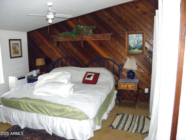 bedroom with wooden walls