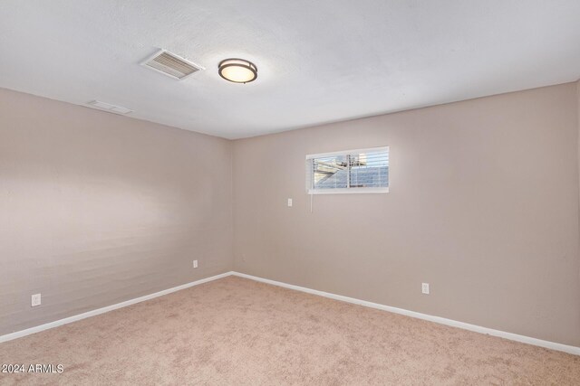 empty room with carpet floors