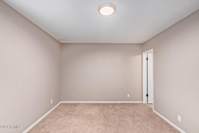 spare room with carpet flooring