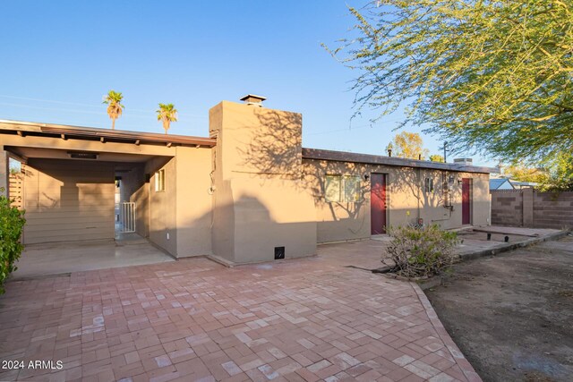 rear view of house with a patio area