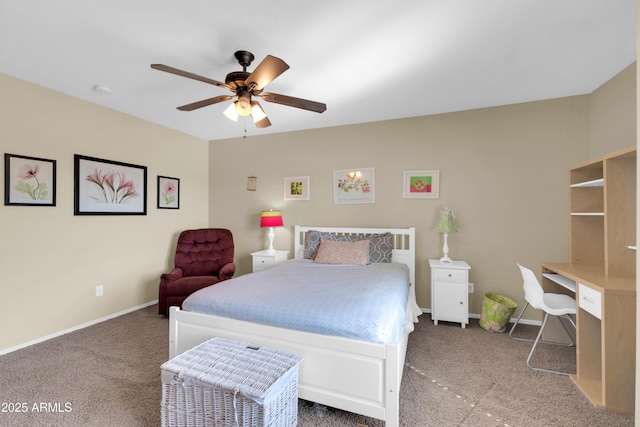 carpeted bedroom featuring baseboards and a ceiling fan