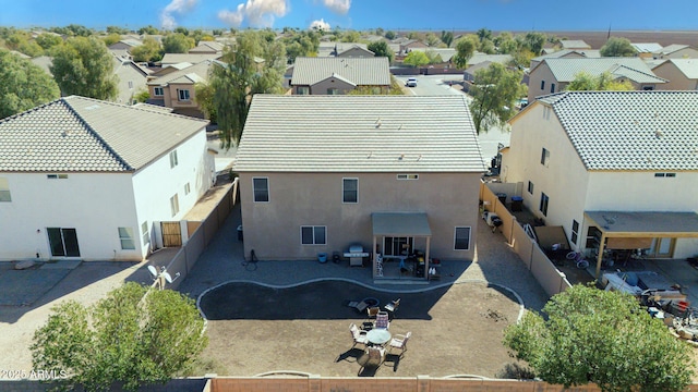 birds eye view of property with a residential view