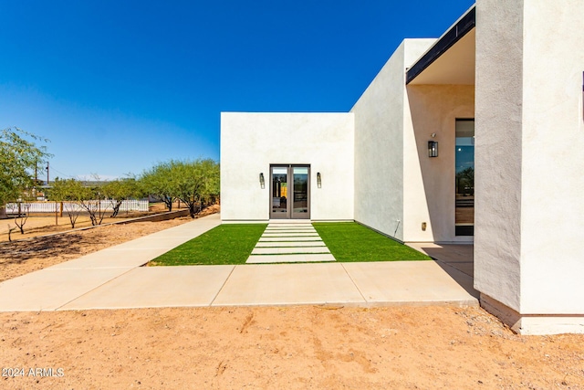 23008 E Galveston St, Mesa, AZ 85212 - doorway to property featuring stucco siding and french doors