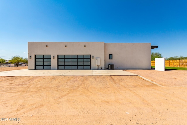 23008 E Galveston St, Mesa, AZ 85212 - view of front of property with driveway, fence, central air condition unit, a garage, and stucco siding