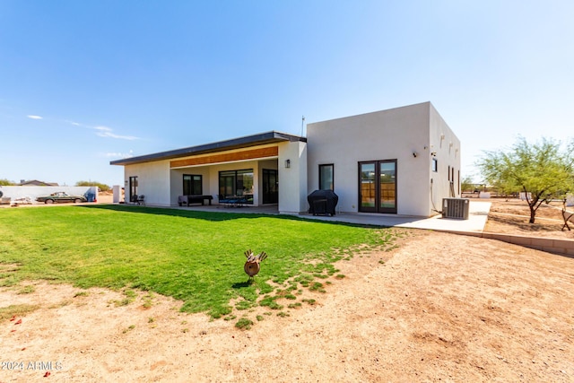 23008 E Galveston St, Mesa, AZ 85212 - rear view of property with stucco siding, a patio, central AC, and a yard