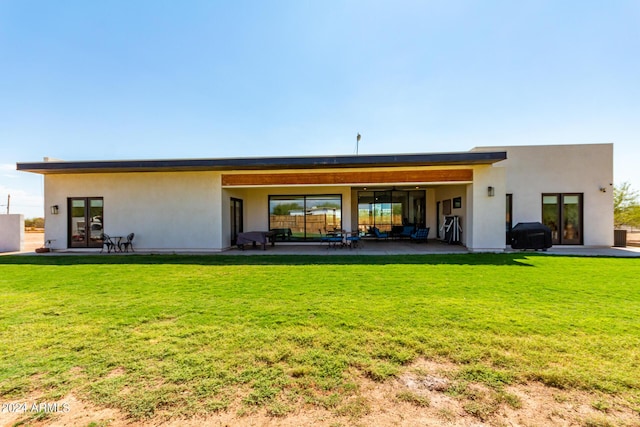 23008 E Galveston St, Mesa, AZ 85212 - back of house with stucco siding, a patio, and a yard