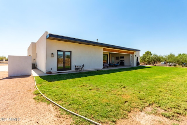 23008 E Galveston St, Mesa, AZ 85212 - rear view of house with french doors, stucco siding, a yard, and a patio area