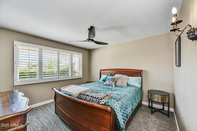 bedroom featuring carpet flooring, baseboards, and ceiling fan