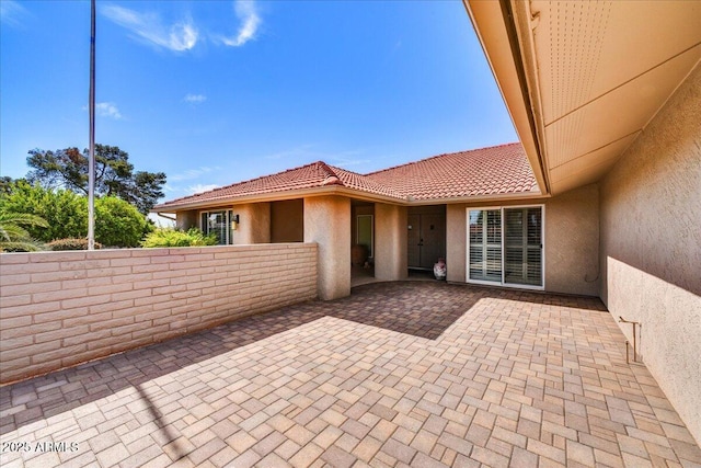 view of patio with fence
