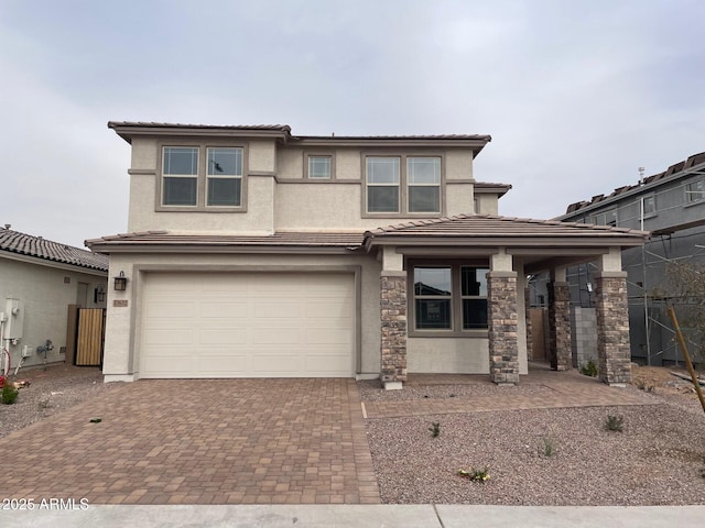 view of front of property with a garage