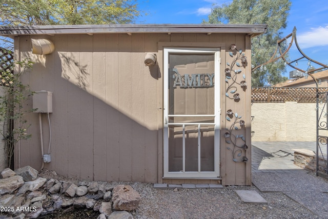 property entrance featuring fence