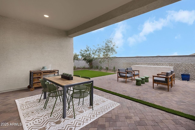 24223 W Illini St, Buckeye, AZ 85326 - fenced backyard featuring a patio and outdoor dining area