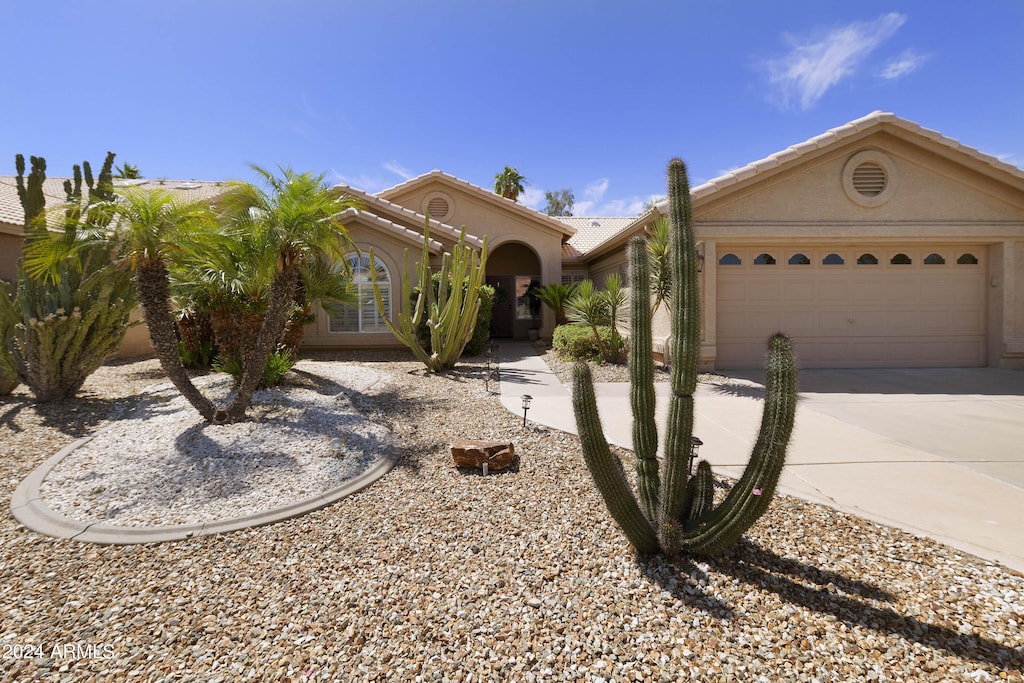 view of front of property with a garage