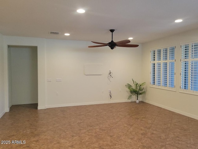 unfurnished room featuring baseboards, visible vents, a ceiling fan, and recessed lighting