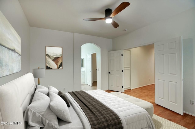 bedroom featuring light wood-type flooring and ceiling fan